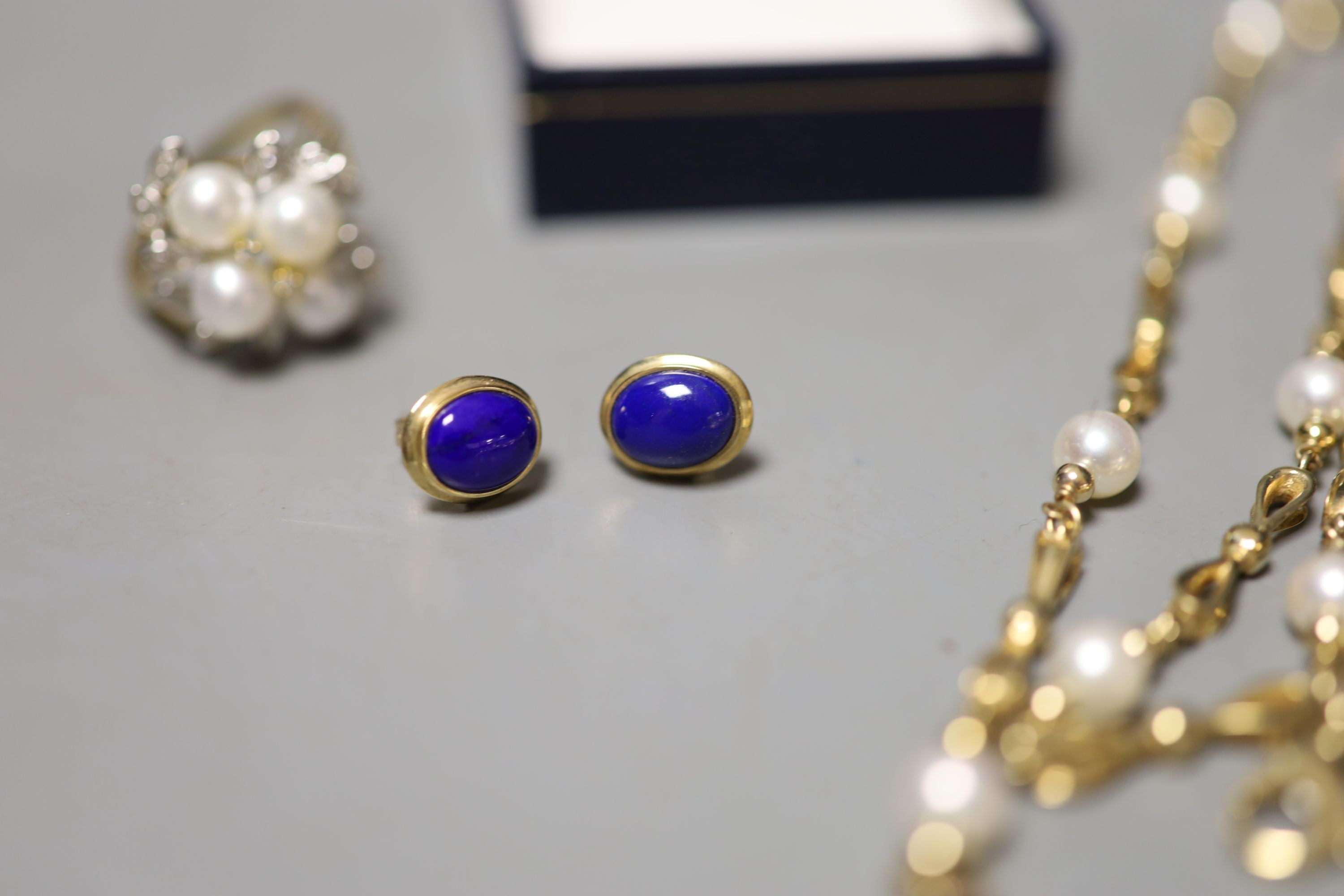 A pair of 9ct and lapis lazuli ear studs, a 9ct and cultured pearl necklace, gross 18.9 grams, a pair of 750, sapphire and diamond set oval ear studs, a 9ct dress rings and a quantity of assorted costume jewellery.